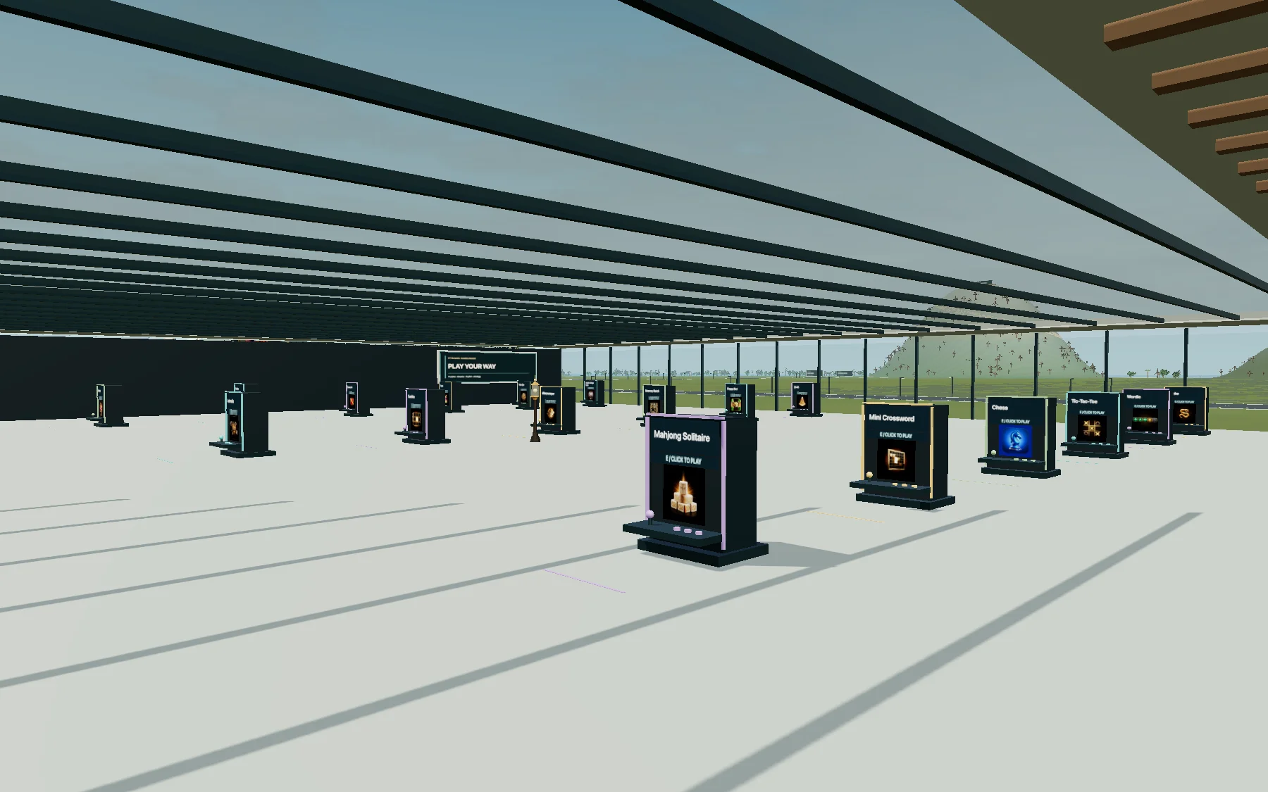 Spacious Games Arcade with compact upright cabinets, readable game titles and clear individual play bays