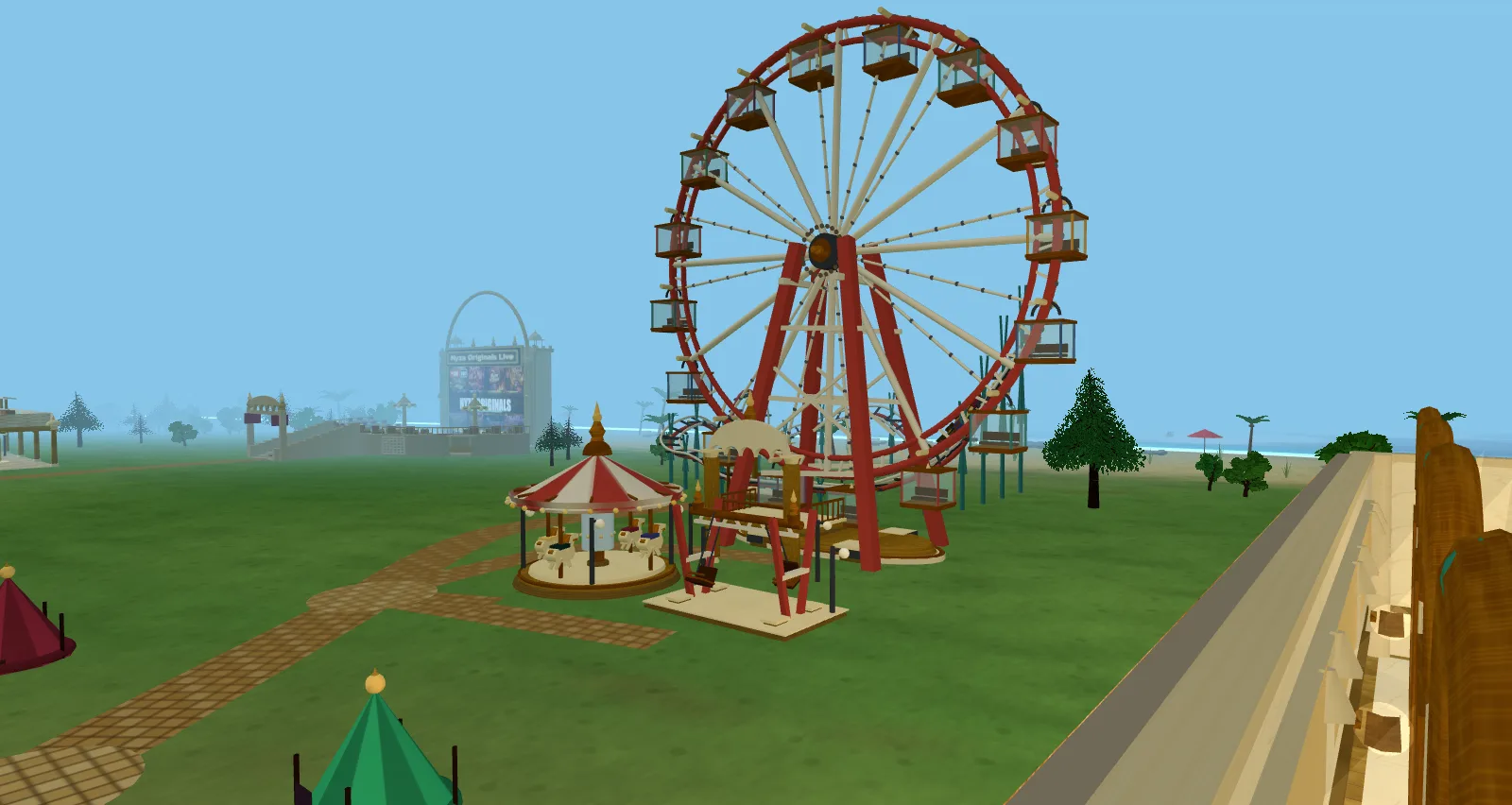 The rides — the ferris wheel with glass gondolas, the carousel and the swing ride by the beach